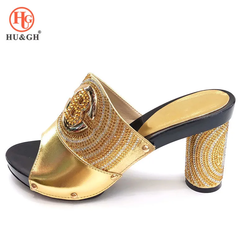 gold sandals and bag