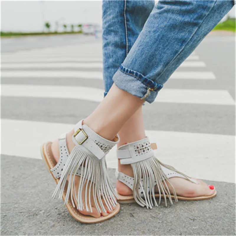 Flat sandals women 2017 summer luxury Black Casual Bohemia elegant sexy Beach Tassel decorated Shoes Open