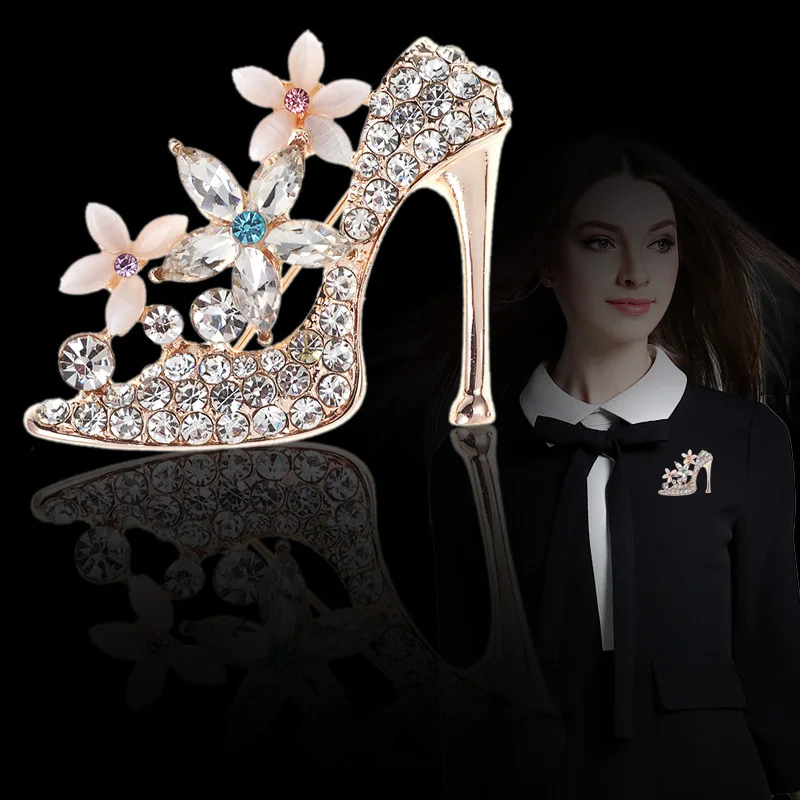 black heels with brooch