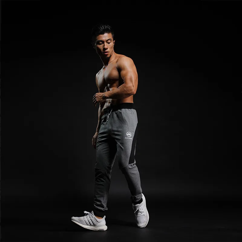 2019 Fashion Mens Pants New Solid Color Casual Soft Elastic Cotton Skinny Sweatpants Bodybuilding Pencil Trousers Gyms Clothing