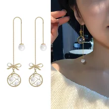 Япония и Южная Корея версия темперамента лук жемчужина Длинные кисточкой уха линии серьги "Ловцы снов"