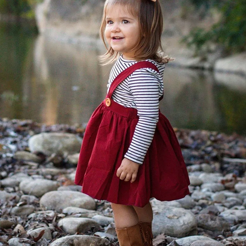 Новое платье для маленьких девочек одноцветное Мягкий хлопок Draped Button ремень юбки Высокое качество Дети Мода Повседневное Плотная одежда юбки