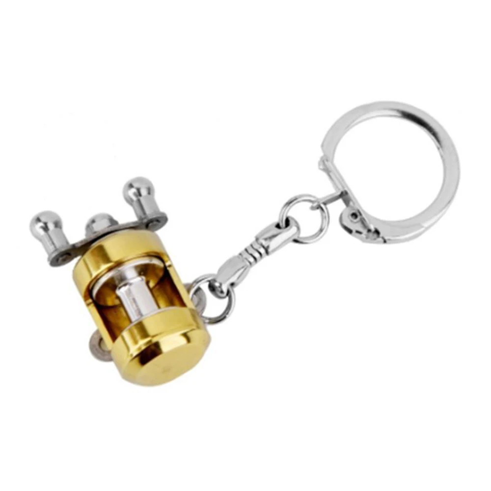 

1 pc Creative Gold Color Fly Reel Key Chain Trolling Reel Model Fishing Metal Keychain Withe Small Pendant For Fishing Lover