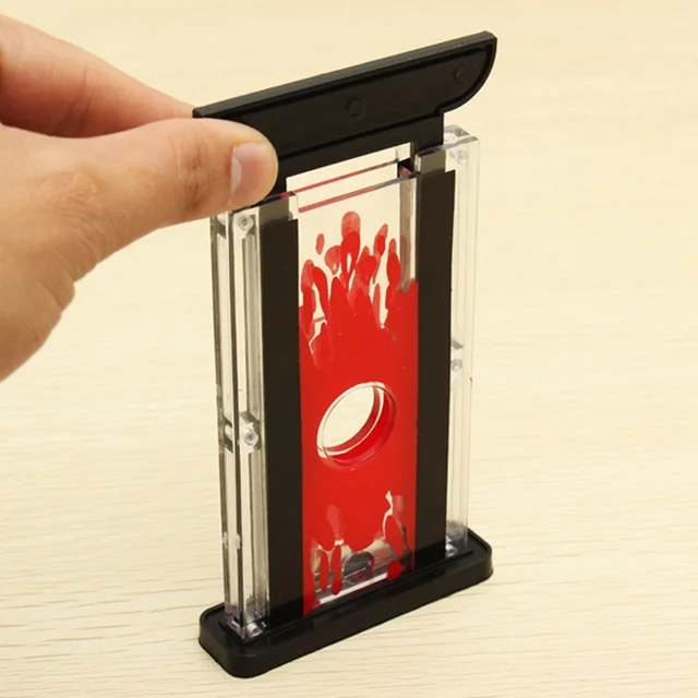 tour de magie guillotine coupe doigt