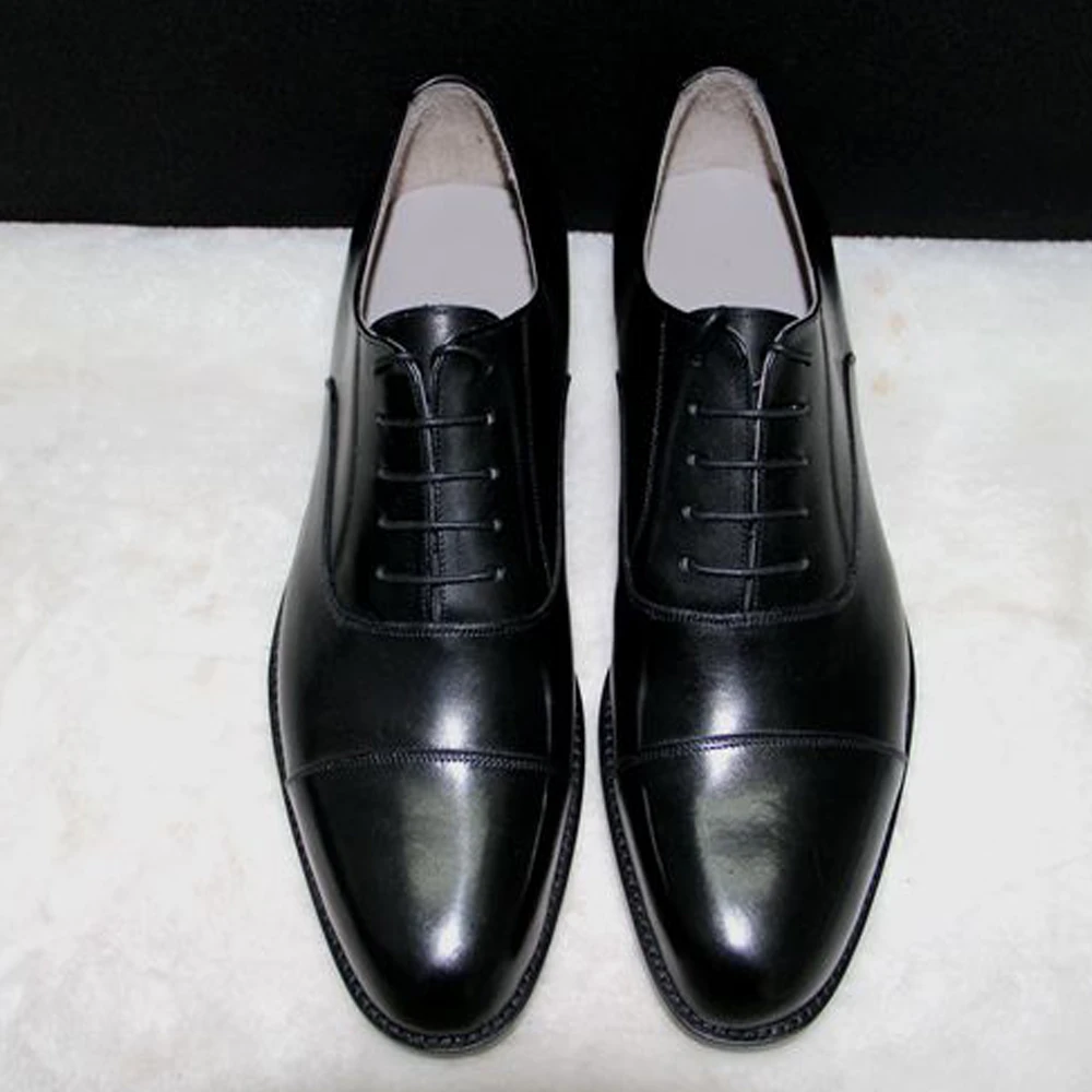 cap toe with tuxedo