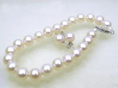 

Free Shipping >>>>> Noblest 9-10mm AAA+ Genuine South Sea white pearl bracelet earring 7.5" 8