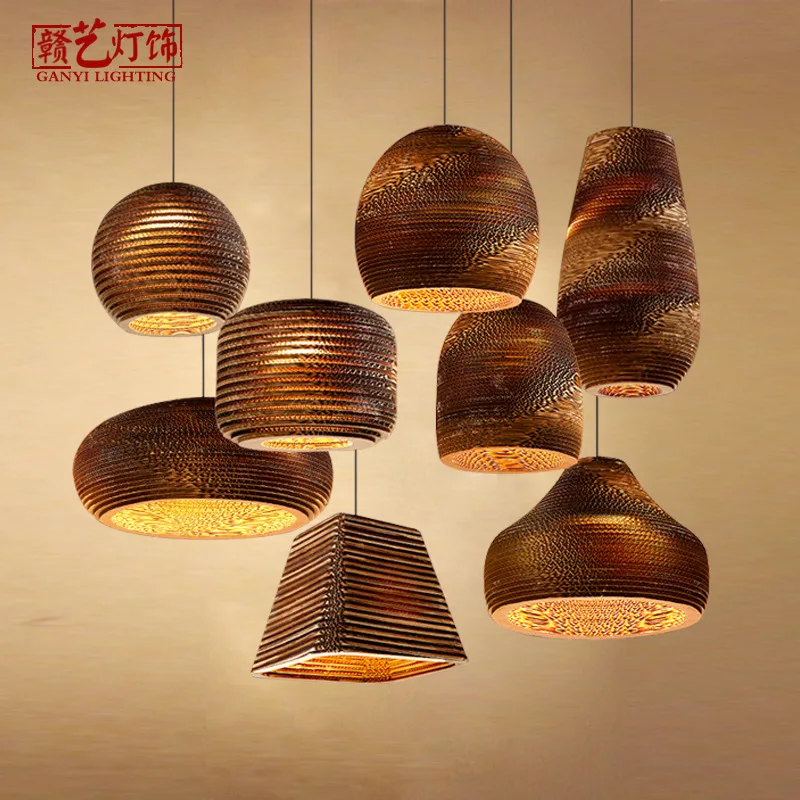 

honeycomb chandelier, personalized corrugated cardboard lamp, Thai hotel restaurant, retro naked pupa chandelier.
