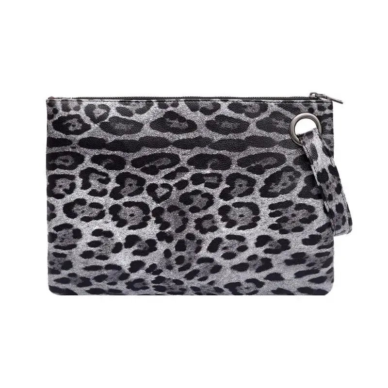black and white zebra print clutch bag
