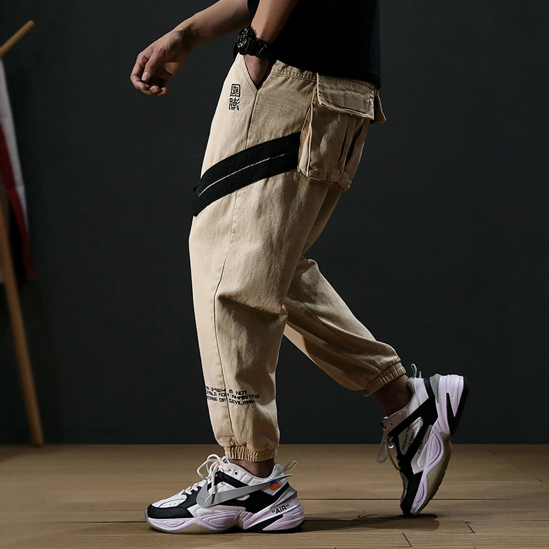 Fashion Streetwear Men Jeans Loose Stripe Spliced Harem Trousers Big Pocket Cargo Pants Slack Bottom Hip Hop Joggers Jeans Men