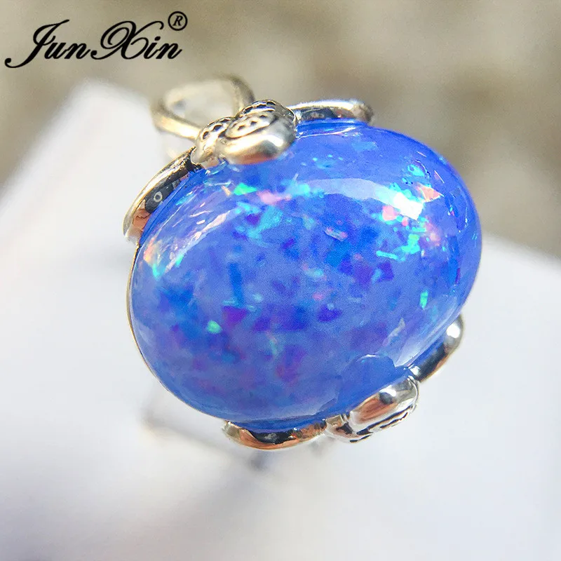 

JUNXIN Luxury Big Stone Female Male Ring Blue/Pink/White Fire Opal Rings For Women Men Antique Silver Color Couples Wedding Ring