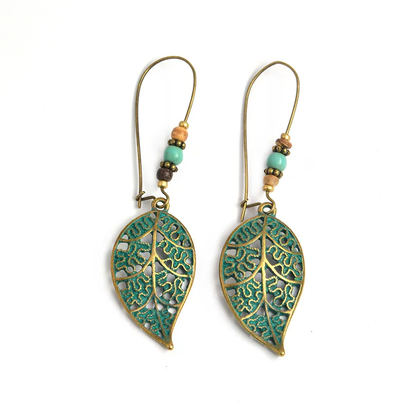 

European and American new earrings Retro ethnic style openwork leaves beads pendant earrings earrings