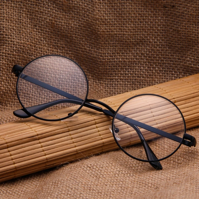 Nueva moda Vintage hombres mujeres Retro gafas redondas gafas lente transparente caliente Unisex