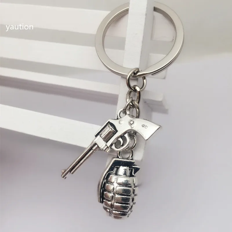 

1pcs New Antique silver 3D Military Grenade + Gothic metal gun Pendant Keychain