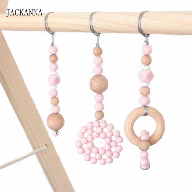 

Baby Teether Play Gym Toy Safe Silicone & Wood Baby Hanger Toys Toddler Teething Rattle Wooden Teether Nursery Toy Newborn Gifts