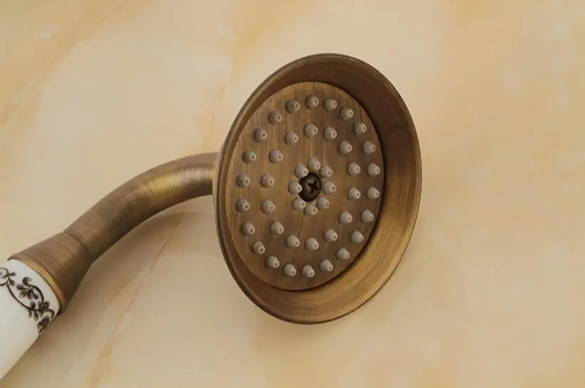 Antigo bronze clássico telefone realizada cabeça de