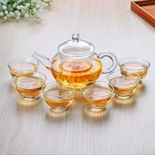 Elegante Calentar la Tetera de Vidrio Resistente Al Calor 220 ml con Filtro de caldera 30 ml 6 UNIDS Cristal Flor Taza de Té Del Puer sistemas de Oficina Juego de Té