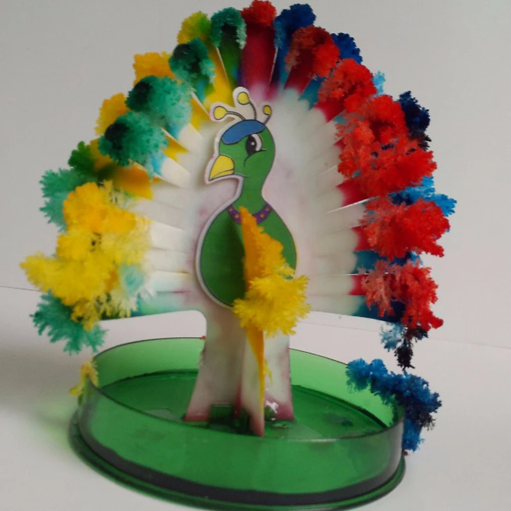

2019 12cm H Multicolor Paper Magic Growing Firebird Tree Magically Grow Christmas Peacock Trees Arbol Magico Kids Science Toys
