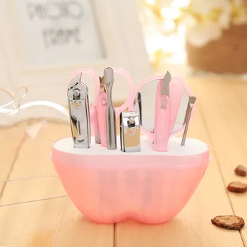 

9 in 1 Apple Shaped Nail Care Kit Steel Manicure Set Nail Clippers Eyebrow Tweezers Cuticle Grooming Tool Wedding Gift