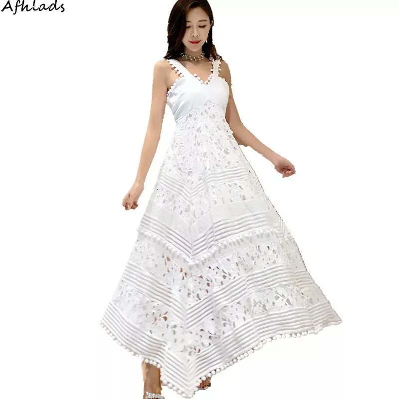 

Spring and summer new holiday wind V-neck ladies hollow out embroidery patchwork lace irregular spaghetti strap long white dress