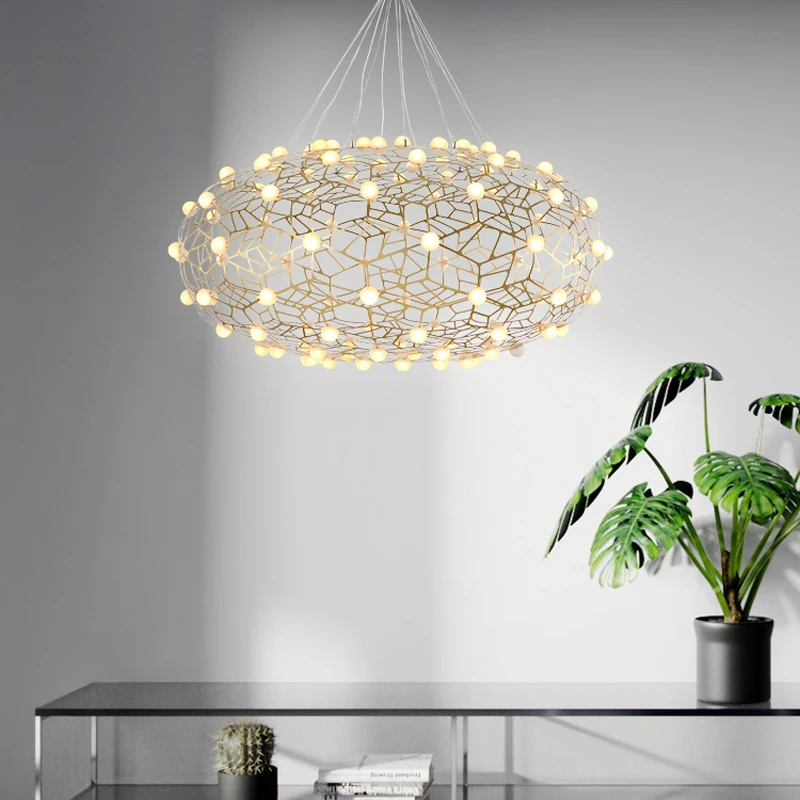 

Postmodern design starry gold plated stainless steel chandelier Nordic simple hollow LED lighting restaurant light luxury decor