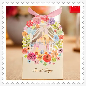 

Free shipping!100pcs/lot!Romantic Flower Butterfly Laser Cut Decoration Party Wedding favor Supplies Paper candy chocolate boxes