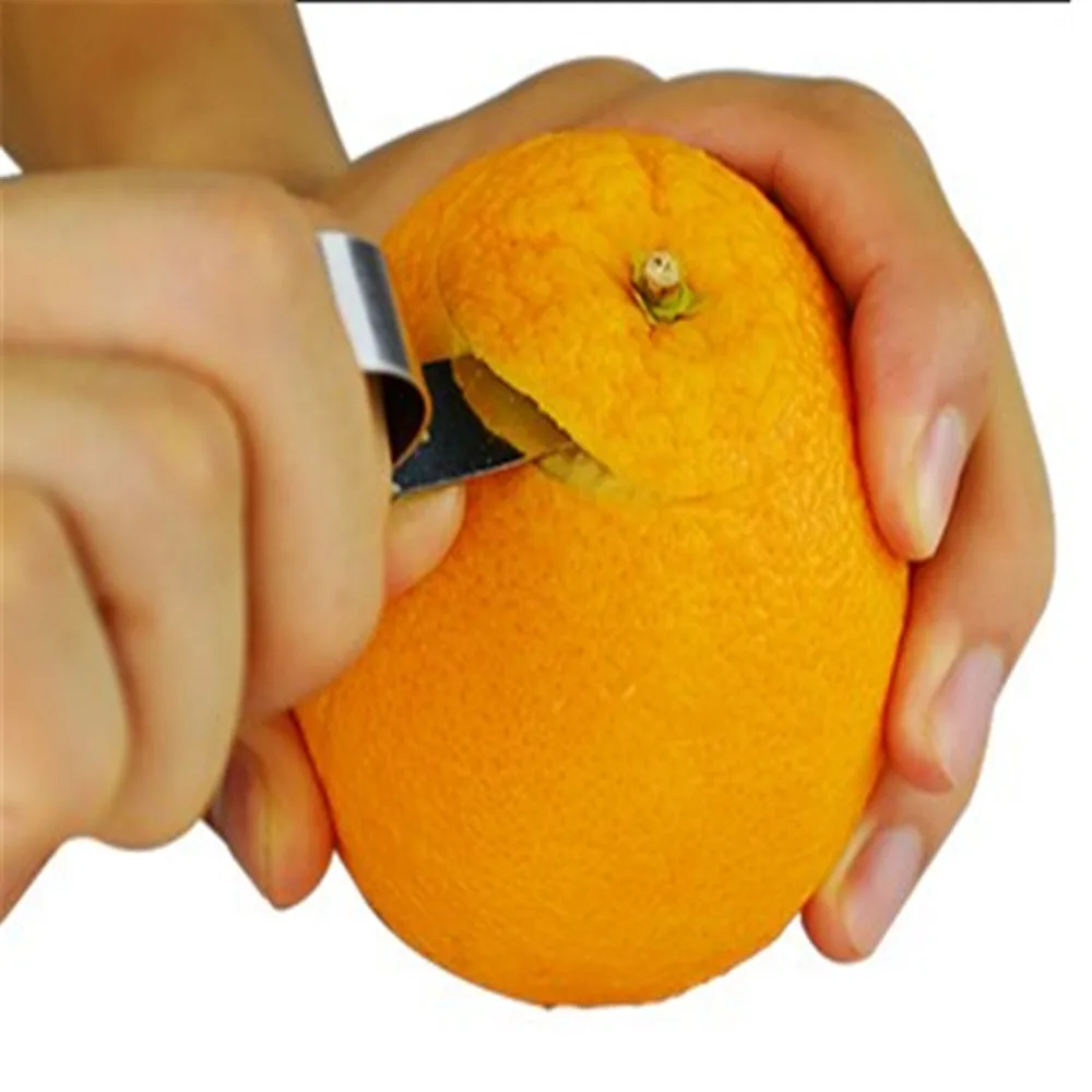 Orange is orange peel stainless steel ring is cut for orange peeler