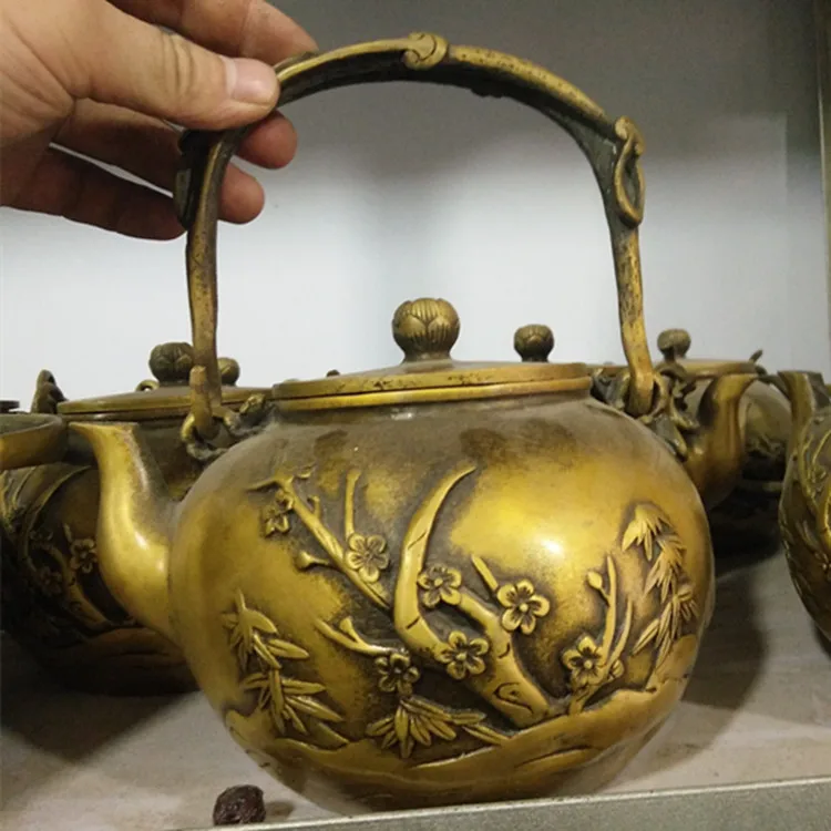 

TNUKK A collection of vintage retro bronze brass handicrafts. Plum chrysanthemum four gentlemen relief.
