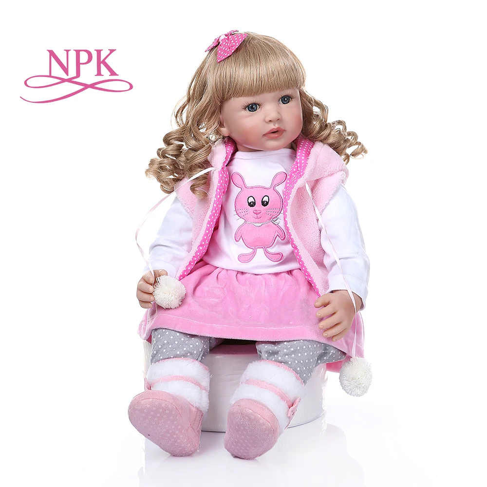 

NPK60CM lifelike reborn toddler baby silicone girl doll with long curly blonde hair in pink rabbit dress doll toy Christmas Gift