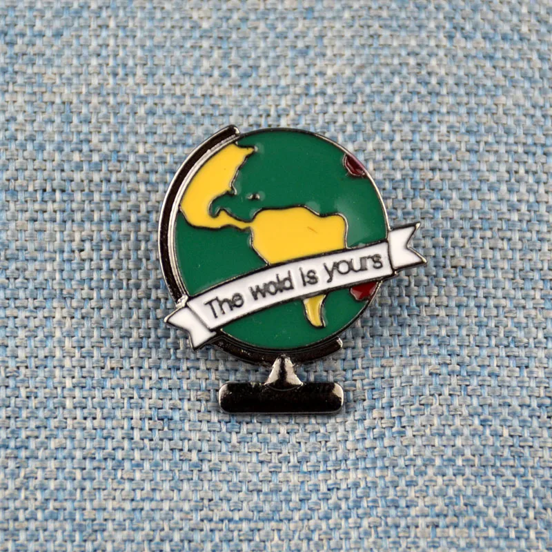

The world is yours enamel pin world map badge travel lapel pin brooch