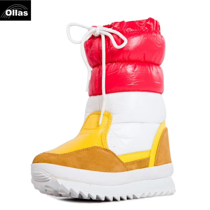 white and rainbow football boots