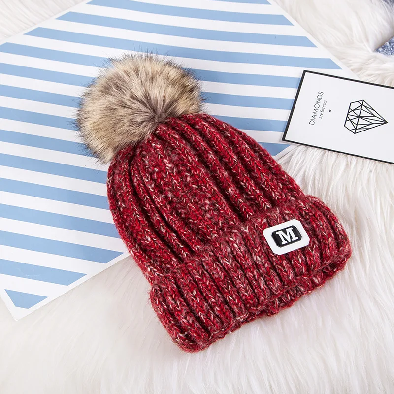 

2018 M letter Fashion Solid Warm Hats New Pom Poms Winter Hat for Women Knitted Beanies Cap Brand Thick Female Cap Wholesale