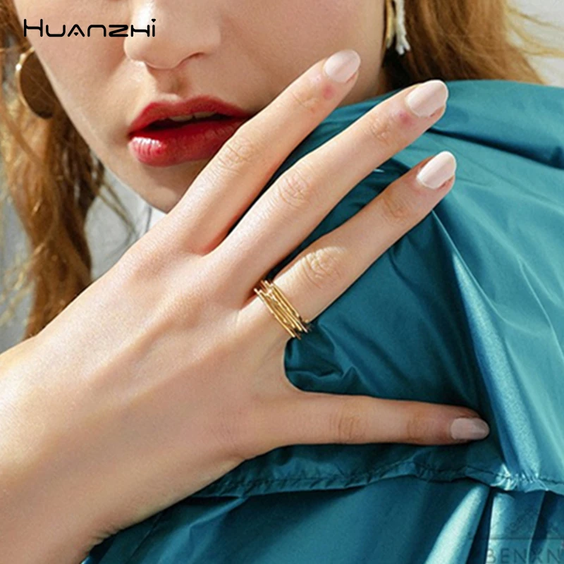 

HUANZHI 2019 Korean New Geometric Rhombus Irregular Multi-layer Winding Hollow Cross Alloy Rings for Women Girls Index Finger