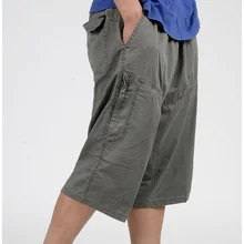 Новые высококачественные мужские повседневные толстые брюки летние свободные плюс размер семь брюки эластичная высокая талия длина до середины икры брюки