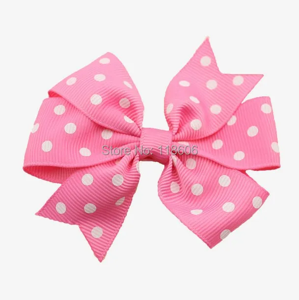 Hot pink Polka dot pinwheel hair bow.jpg