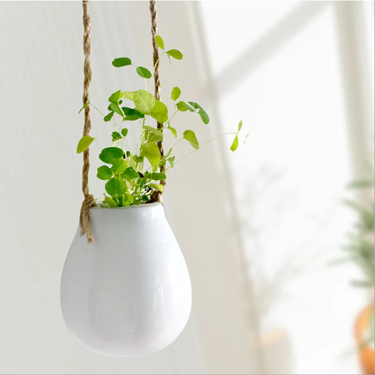 

AIBEI-ZAKKA Ceramic White Hanging Flower Pot Japanese Style Cute Small Egg floret bottle Vertical Garden Pots