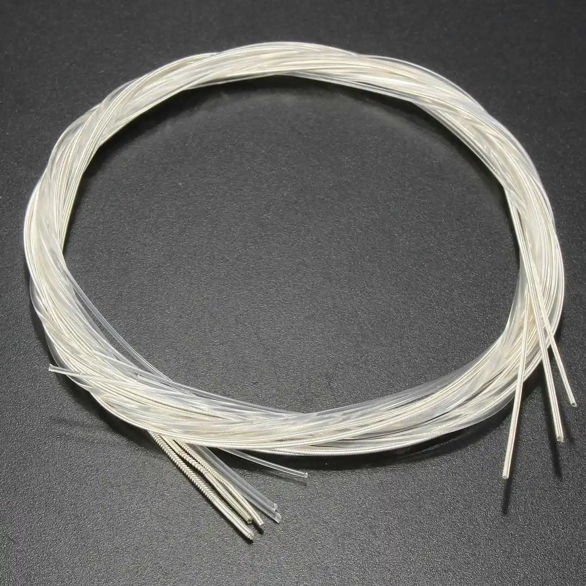 Струны для гитары акустической нейлоновые s328. Нейлоновые струны dcv100nb. Гитара с нейлоновыми струнами. Струна нейлоновая 1. Нейлоновые струны для классической гитары.