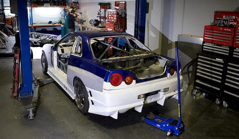 FRP Fiber Glass White Gel Coat Rear Fender Bodykits Fit For Skyline R34 GTT GTR-Conversion Rear Over Fender Flares with Fuel Cap
