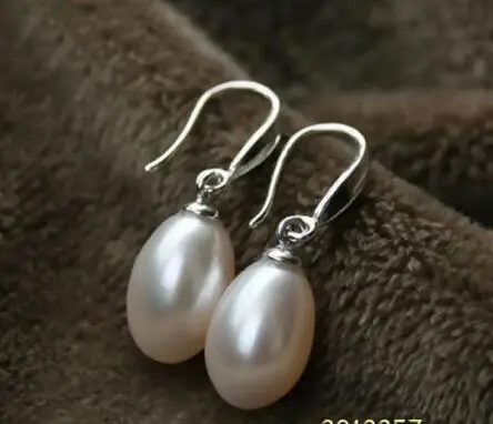 

FREE SHIPPING HOT sell new Style >>>>Baroque pearls 7X9mm oval white pearl teardrop Solid sterling silver earring