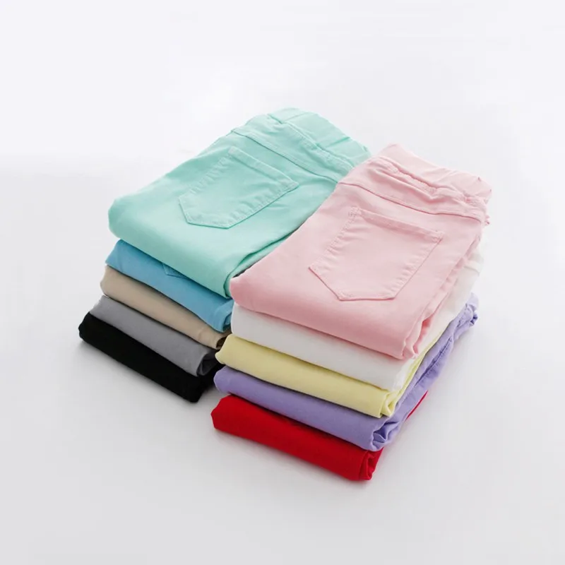 

New children's pencil trousers baby girl candy color stretch self-imitation denim feet pants fashion baby girl clothes