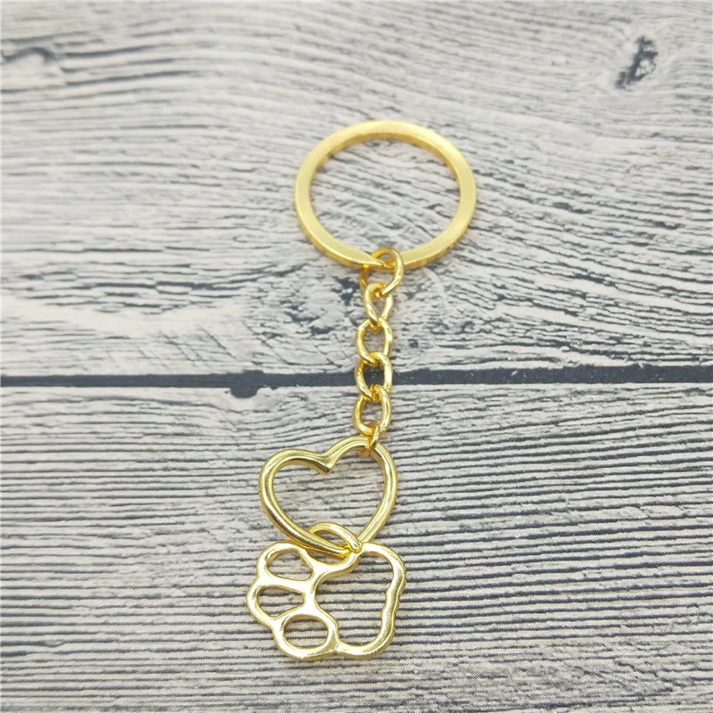 

Hollow Pet Paw Footprint Keychain Shellhard Cute Animal Dog Cat Love Heart Pendant Keychain For Women Girls Jewelry Keychain