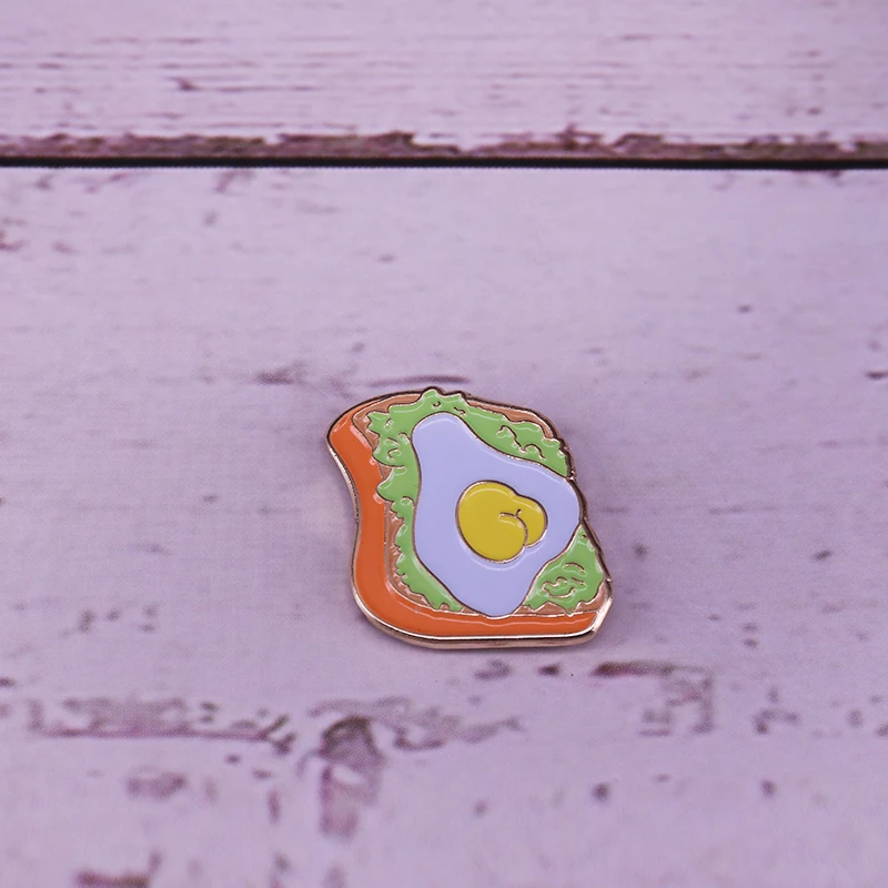 

Avocado toast enamel pin funny vegan foodie accessory