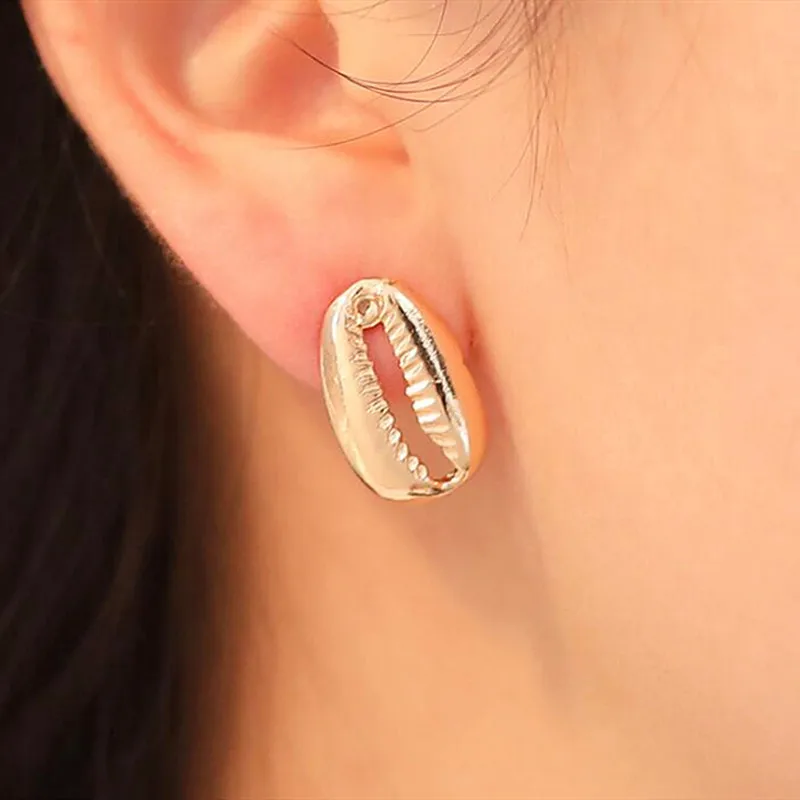 

Timlee E004 Free shipping Simple Personality Shell Irregularity Alloy Studs Earrings Originality Jewelry wholesale