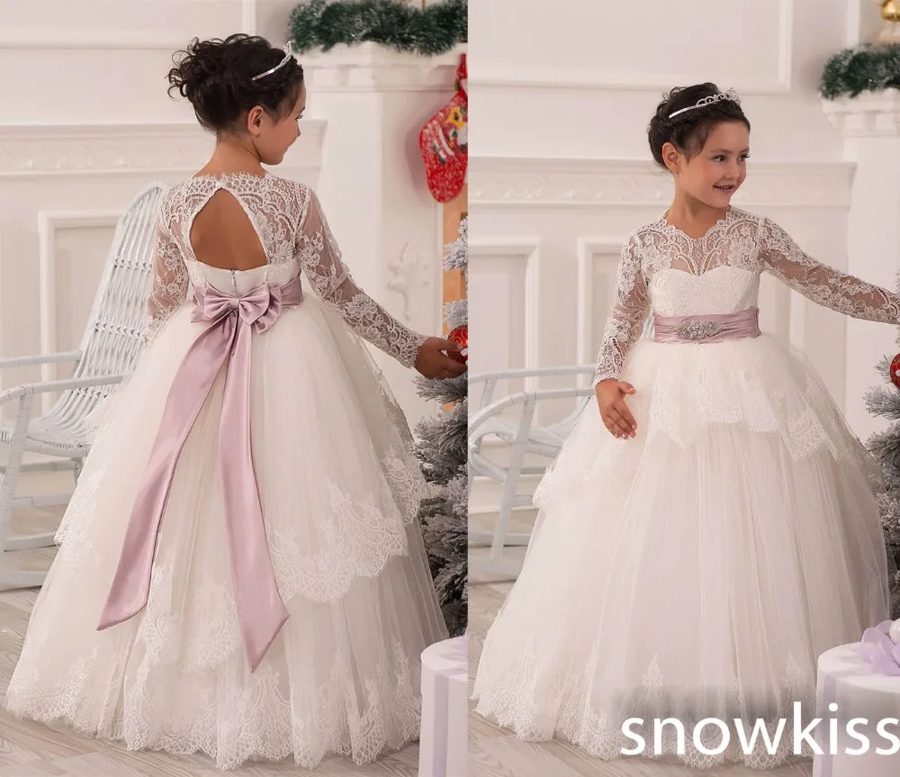 

Beautiful white/ivory sheer lace appliques long sleeves crew neckline flower girl dresses vintage communion backless ball gowns