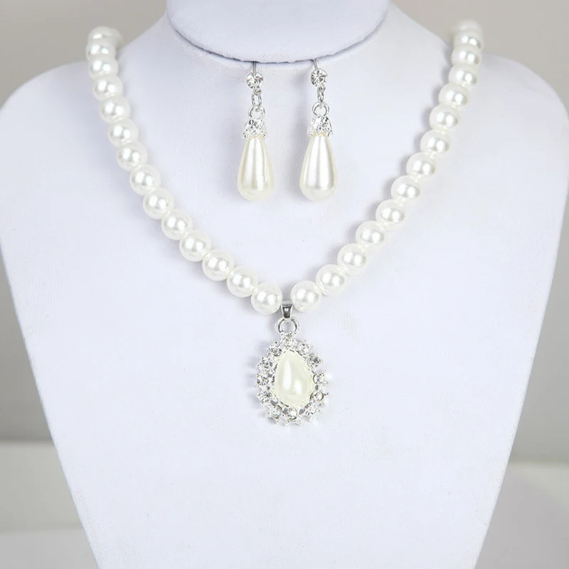 

2018 New Imitation Pearls Pendant Necklace Suit Charm Female Long Necklace Statement Party Earrings Nigerian Wedding Jewelry Set