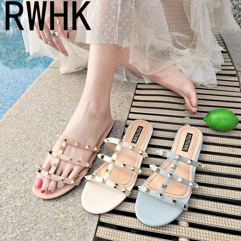 

RWHK 2019 summer new rivet slippers female summer casual open toe flat wear low with a word drag female drag B167