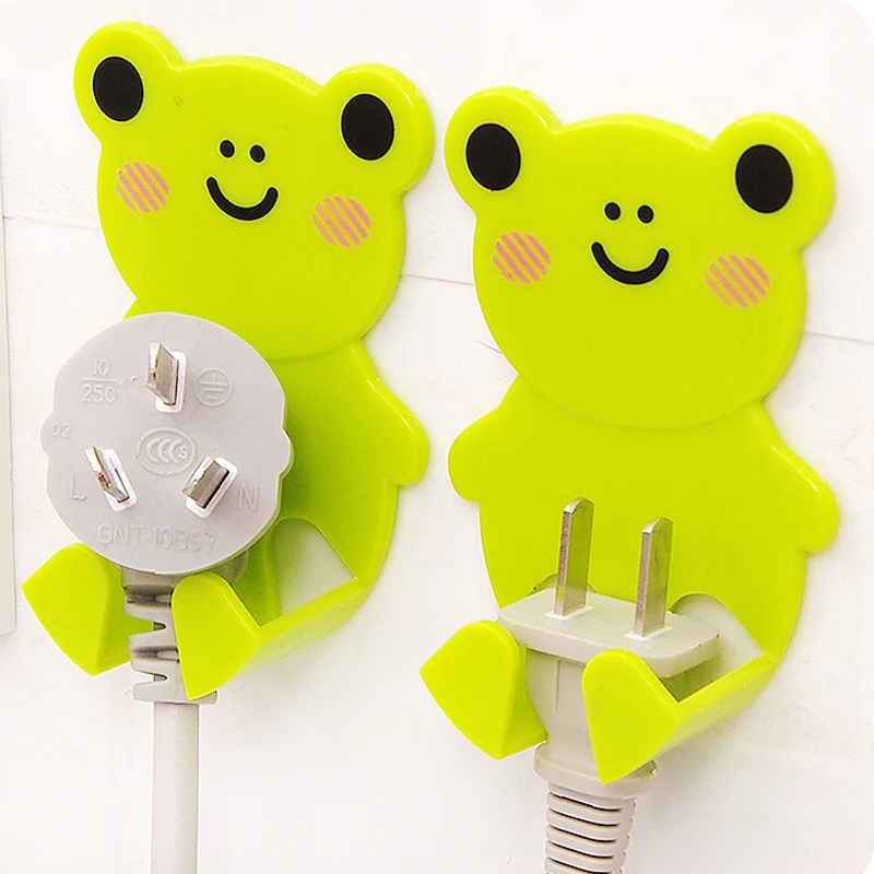 2Pcs/Lot Home Office Muro Adesivo di Plastica Plug Power Socket Holder Hanger Hook Potente Pasta Tipo di Spina Alimentazione