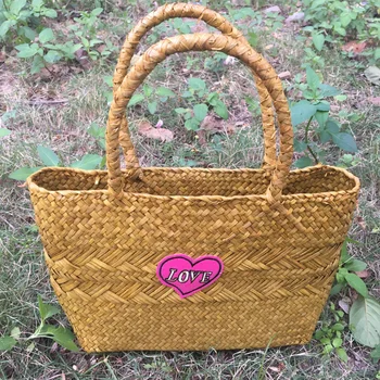 

New seaweed woven bag shoulder bag women's retro fashion embroidery IOVE cane grass woven beach bag wholesale