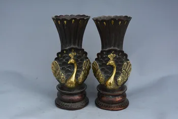 

Very rare Qing Dynasty brass gilt vase,Peacock,A pair
