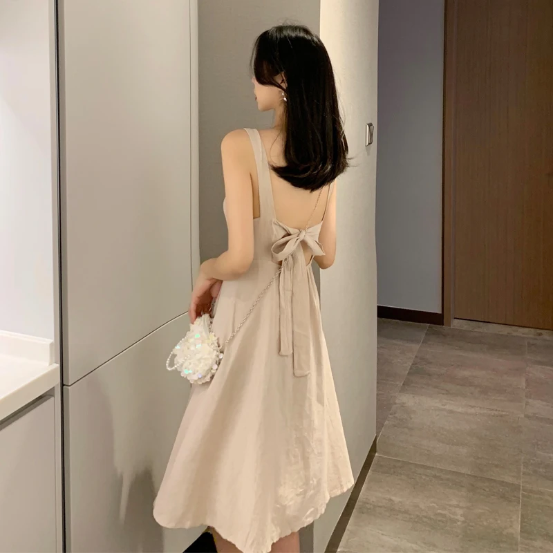 

2019 Summer New Korean Style Dress Fashion Sling Sleeveless Single Row Button Back Strap Bow Backless Solid Color Dress Female