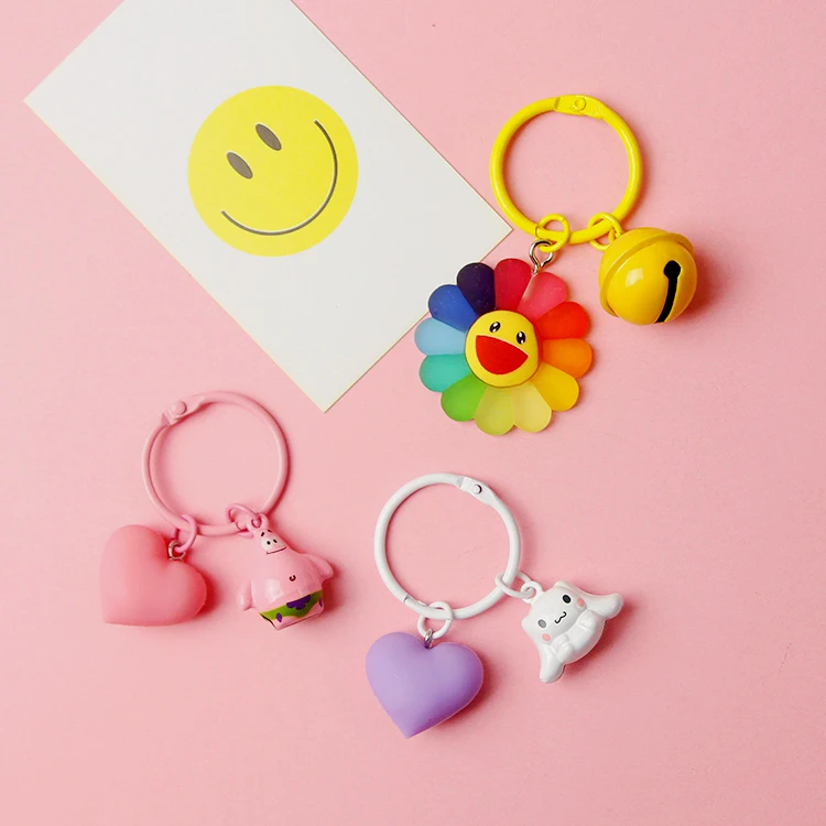 

ins Very Cute Sunshine Smiling Face Heart Bell pompom bag charm keychain llaveros para mujer love doll